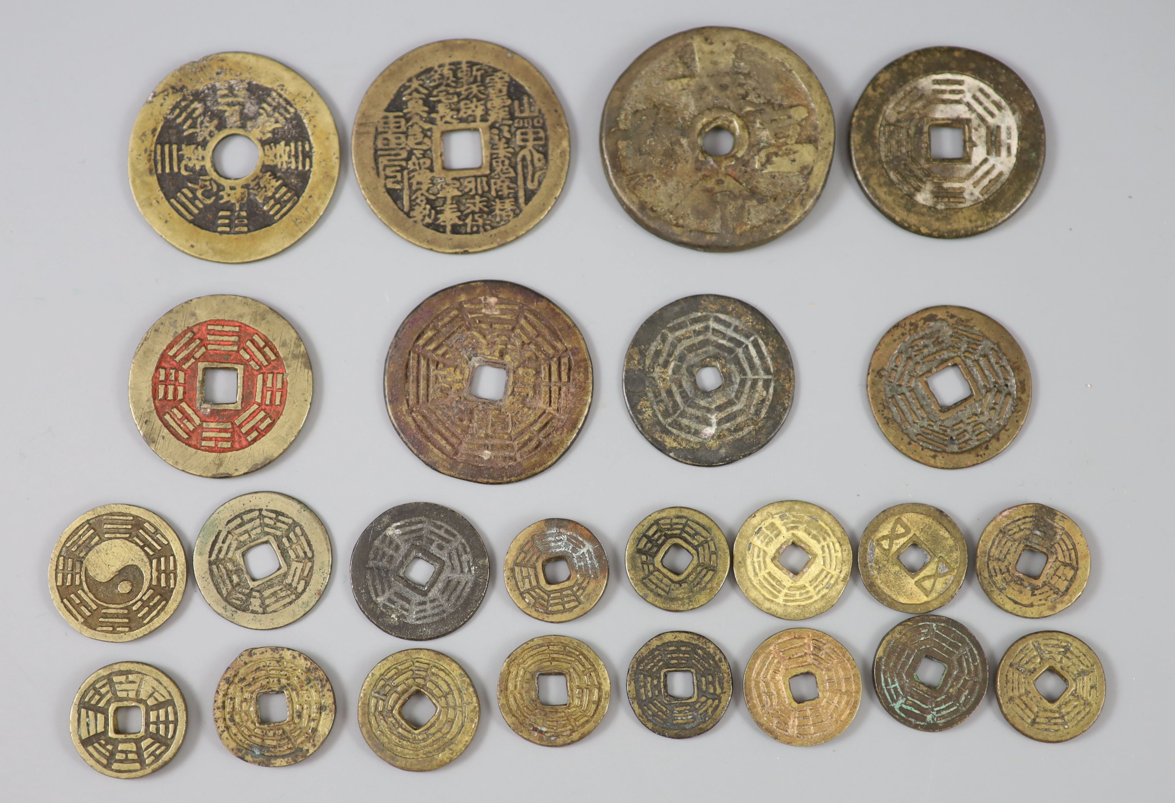 China, 24 bronze charms or amulets, Qing dynasty,